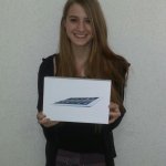 Photo of smiling tablet raffle winner